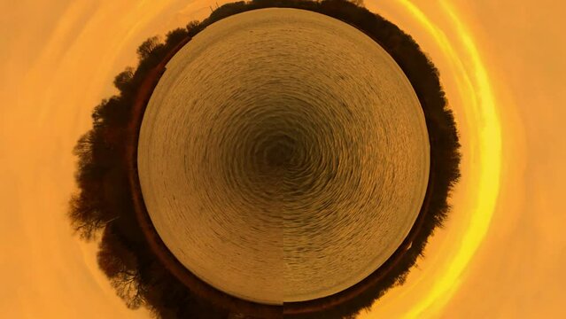 360 degrees of Equirectangular to Stereographic Panorama. Warm yellow Sunset on the big lake. Aerial drone footage with autumn dark nature.