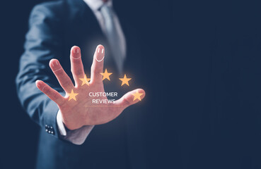 Customer service satisfaction survey concept.Business people or customers show satisfaction by pressing face emoticon smile in satisfaction on virtual touch screen.