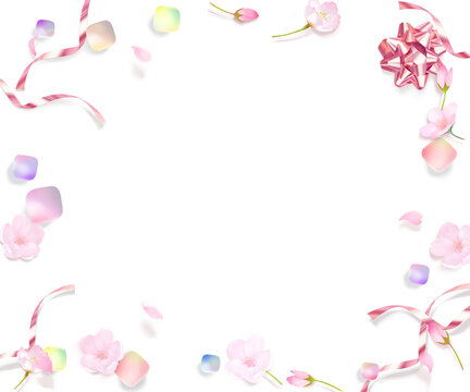 桜の花とつぼみと花びらー虹色宝石の転がるかわいいピンクゴールドリボンフレームイラスト白バック素材