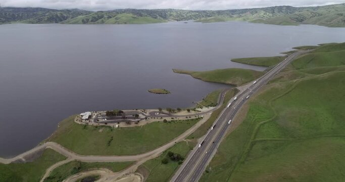 Lake of San Luis Reservoir in Background near Los Banos and Upper Cottonwood Creek Wildlife Area. Highway in Foreground. California. USA