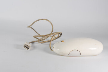 white computer mouse with wired and usb connections isolated on a white background