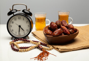 Ramadan food Sweets mixed of dried fruits, Dates premium dates, 
full of date fruits, Arabic coffee, Concept: month fasting culture Muslim prayer, 
1444 Puasa Ramadan Kareem greeting festival
