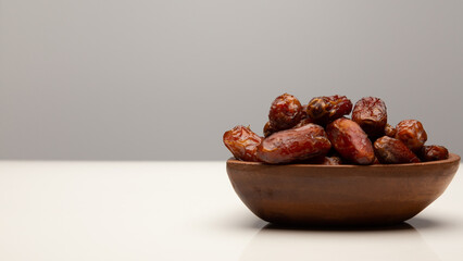 Ramadan food Sweets mixed of dried fruits, Dates premium dates, 
full of date fruits, Arabic coffee, Concept: month fasting culture Muslim prayer, 
1444 Puasa Ramadan Kareem greeting festival
