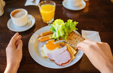 Swedish breakfast in hotel womens hands