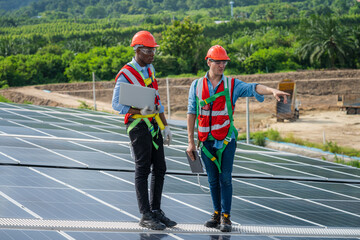 Electrical and instrument technician installation and maintenance electric system solar panel on the roof of factory,Service check installation solar cell.