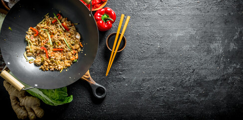 Freshly cooked Chinese wok rice with vegetables and beef.
