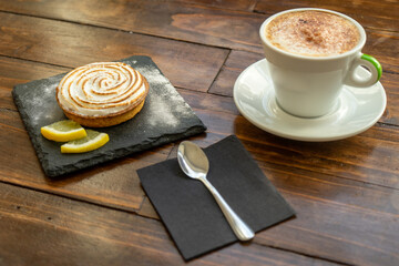 variety of biscuit over bowl an arabic teahouse. Accompanied with a chocolate cake