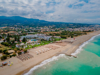 Aerial view of the public beach in the resort town of Elounda on the island of Crete (Greece)