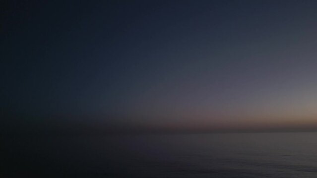 night sky over the sea with falling sickness star