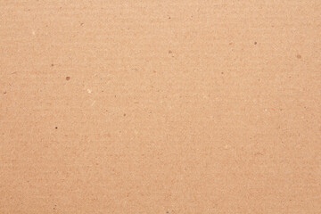 Cardboard sheet texture background, detail of recycle brown paper box pattern.