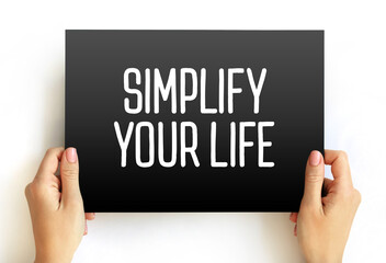 Simplify Your Life text on card, concept background