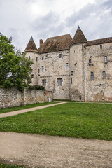 Fototapeta na wymiar Castle Nemours built in 12th century, consists of a fortress surrounded by four corner towers and a high watchtower. Nemours, Seine-et-Marne, Ile-de-France, France.
