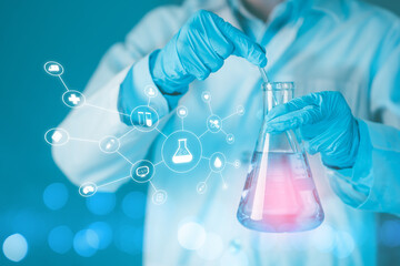 Healthcare and science technology. Scientist hand hold erlenmeyer flask filled with sample...