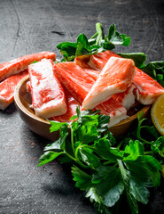 Crab sticks with parsley.