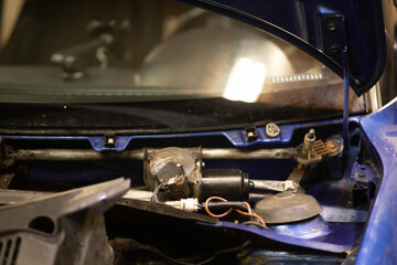 car windshield wiper motor repair. - obrazy, fototapety, plakaty