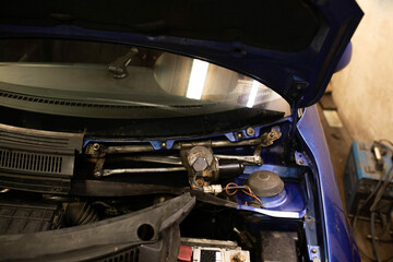 car windshield wiper motor repair. - obrazy, fototapety, plakaty