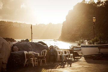 Beautiful fishing village with colourful fishermen's houses, and fishing nets, Marina Corricella on...