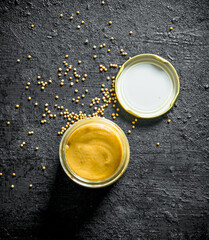 Mustard in a glass jar.