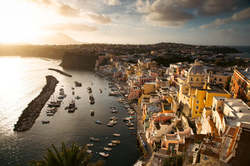 Beautiful fishing village with colourful fishermen's houses in magic sunset, Marina Corricella on...