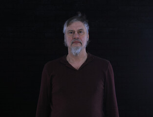 portrait of an old bearded man 50 years old