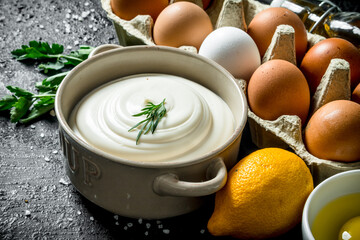 Mayonnaise with parsley, eggs and lemon.