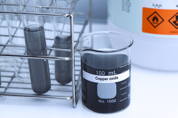 copper oxide in bottle , chemical in the laboratory and industry