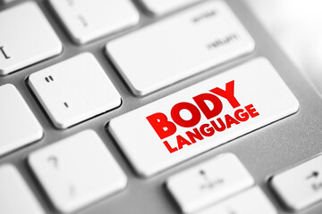 Body language - type of communication in which physical behaviors are used to express or convey the information, text concept button on keyboard