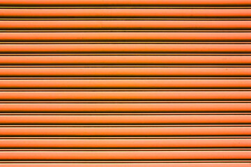 Obraz premium Metal stripes pattern. Ventilation grille texture. Industrial iron metal bars. Grunge grid lines. Rusty metal frame background. Orange color stripe pattern.
