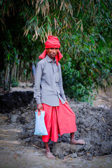 Obraz premium Hindu religious village people celebrating gajan festival wearing colourful costumes