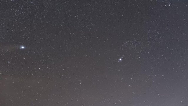 Starry night sky with meteor shower