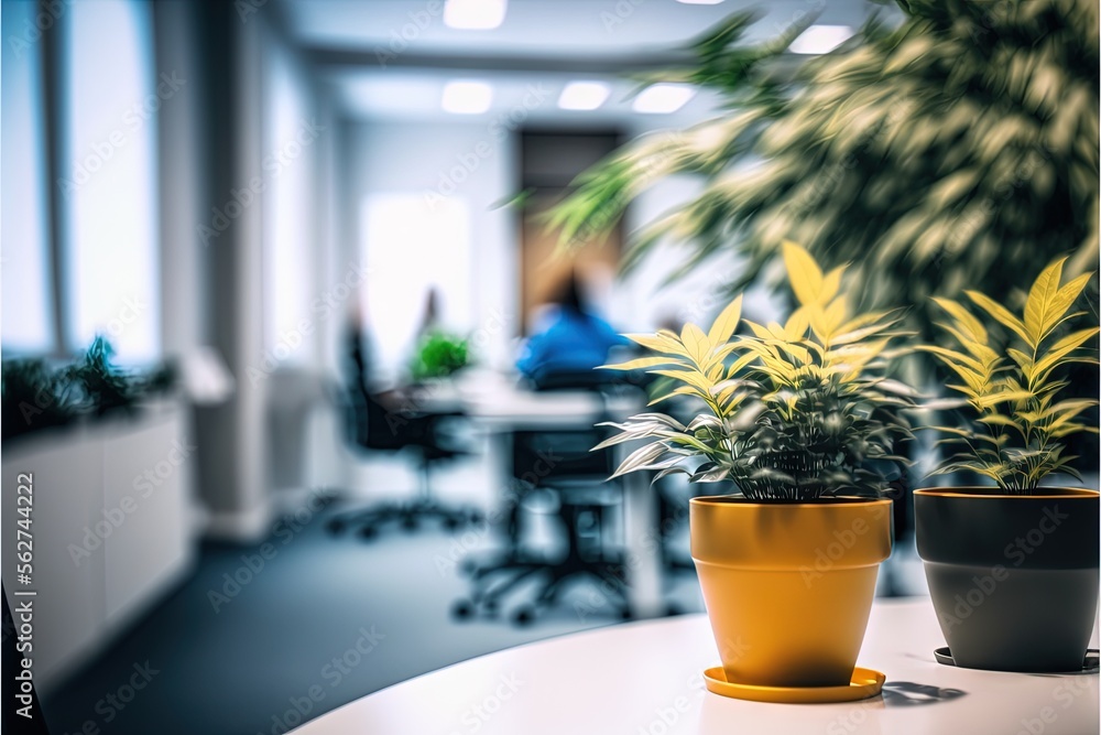 Poster a table with two potted plants on it in an office setting with people in the background on the compu