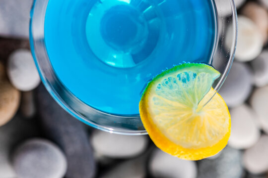 Glass of blue kamikaze drink
