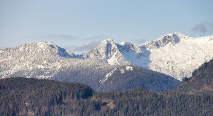 Canadian Mountain Landscape Nature Background. Sunny Winter Day. Howe Sound near Squamish, British Columbia, Canada.