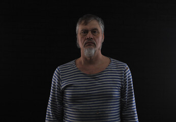 portrait of an old bearded man 50 years old