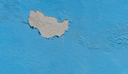 blue painted wall peeling 