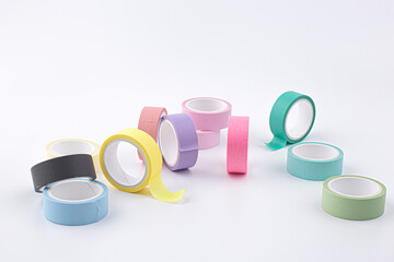 colorful masking tape rolls background on white