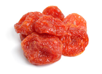 Whole sweet dried tomatoes. Isolated on white background