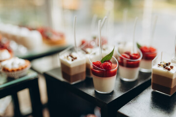 Delicious wedding reception candy bar dessert table