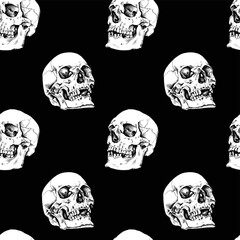 Seamless pattern. Human skulls in a profile. Textile composition, hand drawn style print. Vector black and white illustration.