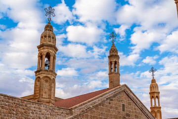 Viev of Mor Gabriel Monastery of Mardin Province, beautiful stone architecture tower wall and door...
