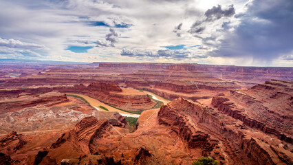 View of the red sandstone canyons carved by the Colorado River at Dead Horse Point in Dead Horse State Park