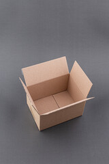 Cardboard box on grey background