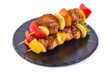 Grilled meat skewers, roasted shish kebab with onion and tomatoes, isolated on white background.