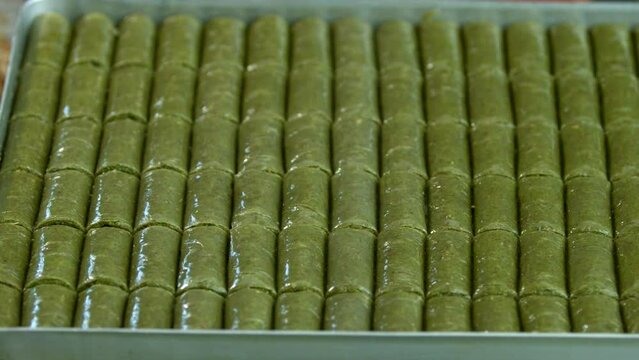 Traditional turkish baklava pistachio pastry. Dilberdudagi, ozel kesim baklava, cikolatali baklava, fistikli baklava, katmer, fistikli kadayif, kattafi, fistik sarma, soguk baklava, midye baklava, cev