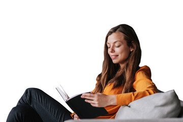 Young adult beautiful brunette woman in orange blouse holding book, relaxing home. Confident...