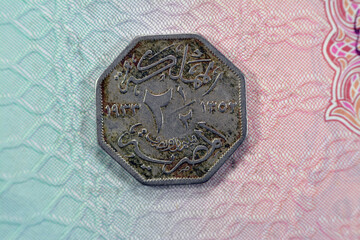 Octagonal old Egyptian coin of two and half 2½ milliemes series 1933 AD 1352 AH features king Fuad...
