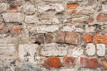 Grunge wall background with old stones texture