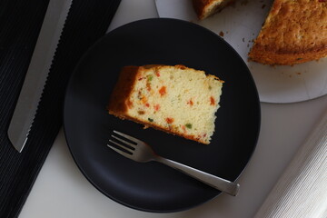 Sliced Tutti fruity buttermilk cake. A type of Indian fruit cake made with tutti frutti or candied...