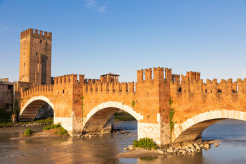 Fototapeta premium Verona, Italy. Castelvecchio bridge on Adige river. Old castle sightseeing at sunrise.