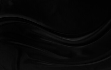 Black gray satin dark fabric texture luxurious shiny that is abstract silk cloth background with patterns soft waves blur beautiful.